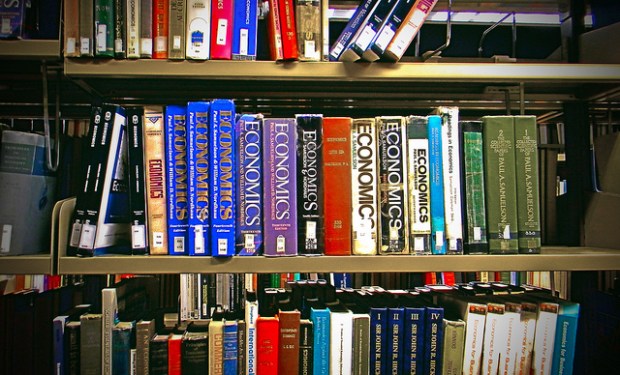 Economics books on library shelf